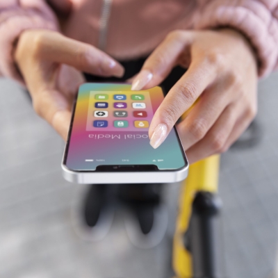 close-up-hands-holding-phone-with-apps